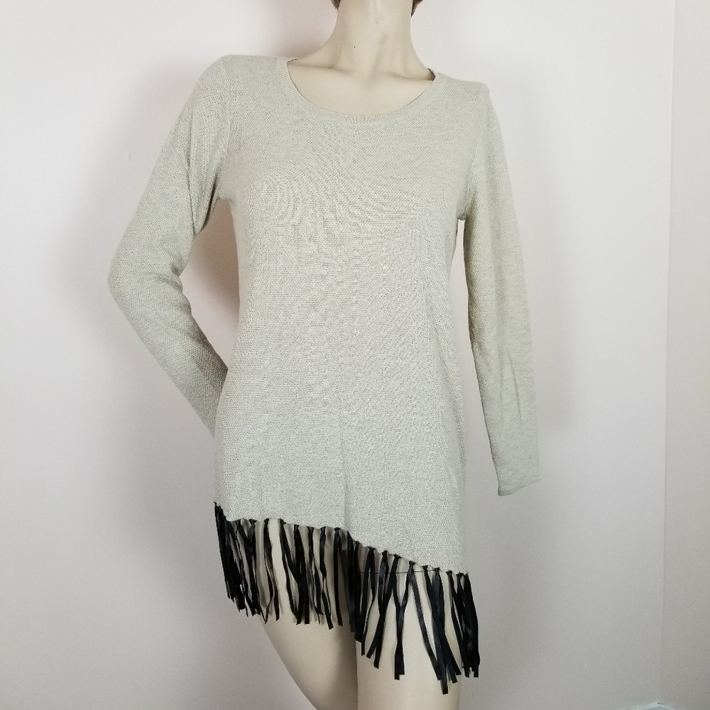 Sogi sweater with asymmetric hem with fringe trim